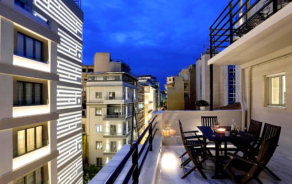 city view balcony with evening lights