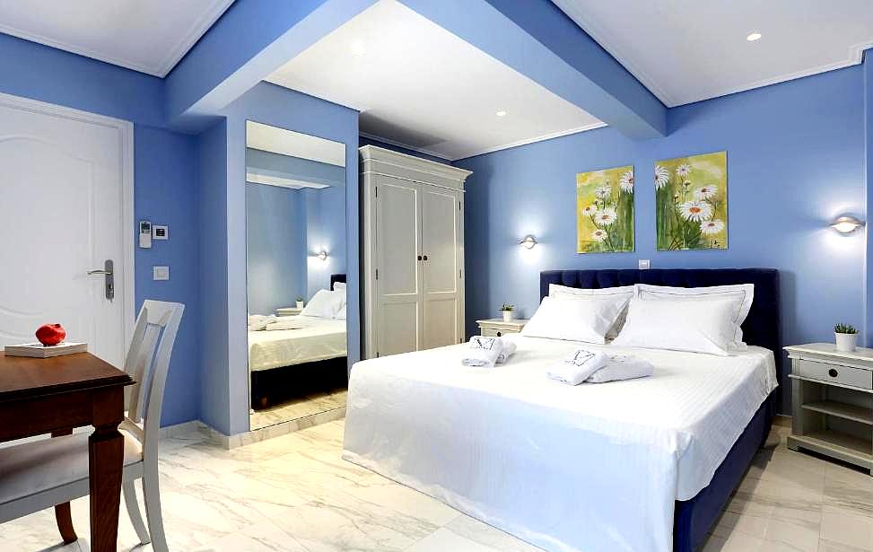 cozy bedroom with blue walls