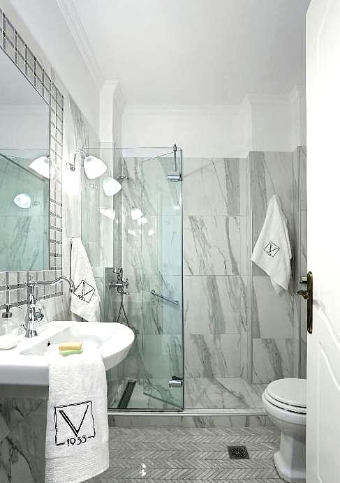 modern marble bathroom with glass shower