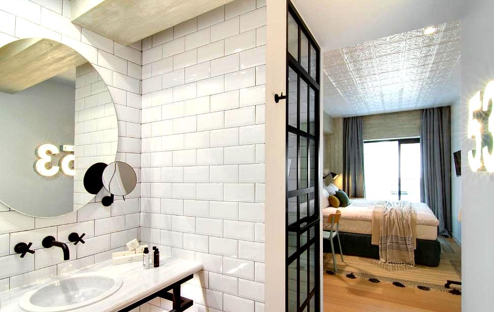 stylish bathroom with modern fixtures and mirror