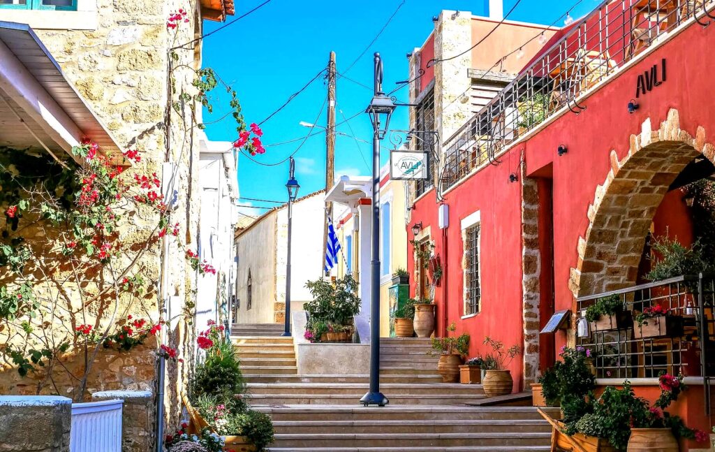 Malia Old Town is a quaint area with traditional houses, narrow streets, and lively nightlife