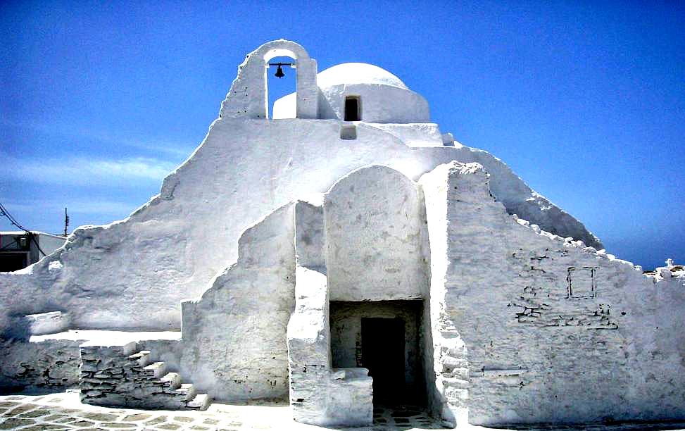 Panagia Paraportiani is an iconic whitewashed church complex with unique architecture, one of the most photographed sites in Mykonos