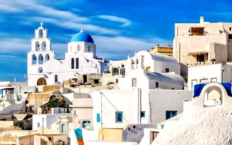 Pyrgos is a traditional village built on a hill, with narrow streets, medieval ruins, and panoramic views of the island