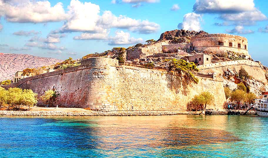 Spinalonga Island features a fortified Venetian castle that was once a leper colony, offering insight into the past