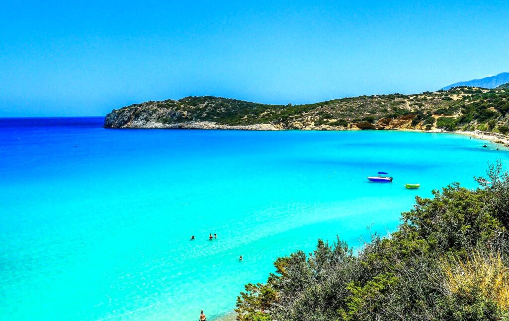 Voulisma Beach is a beautiful beach with fine white sand and crystal clear waters, surrounded by pine trees