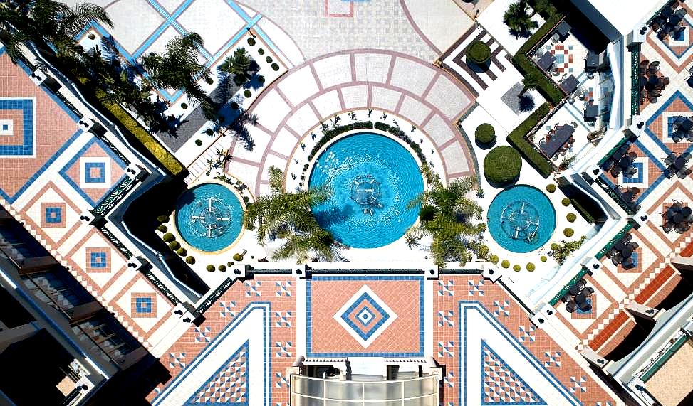 aerial view of courtyard with fountains