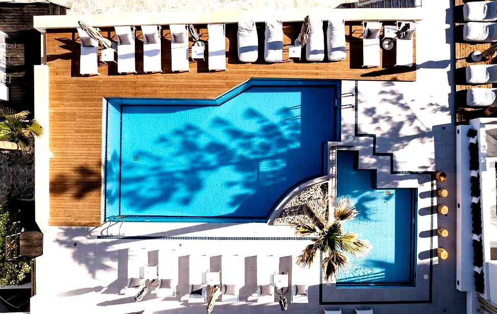 aerial view of luxury pool and sun loungers