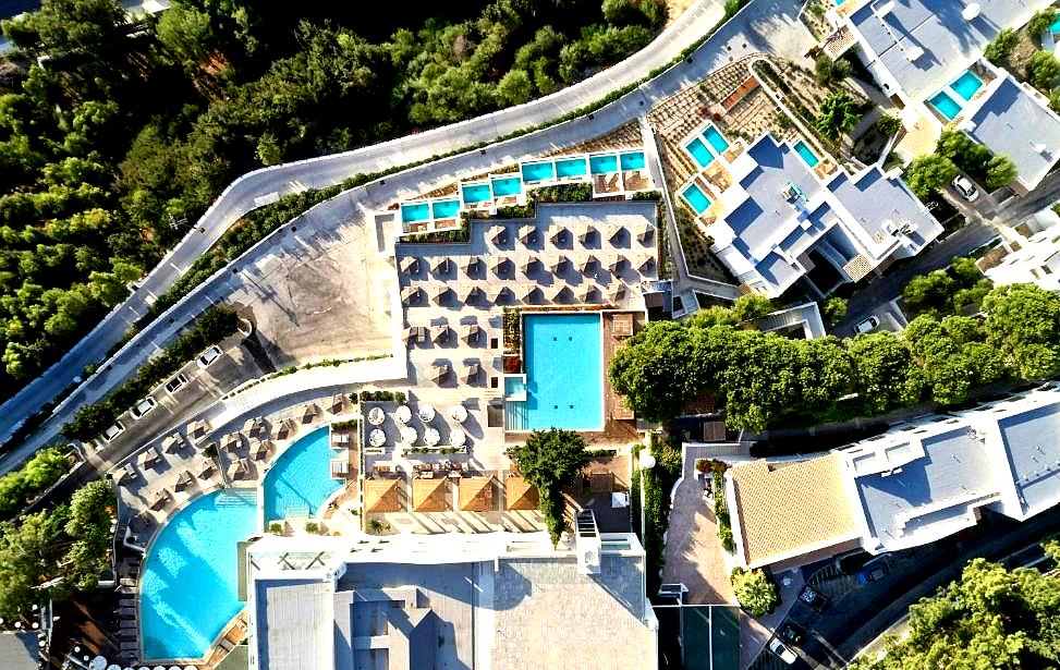 aerial view of resort pools and terraces