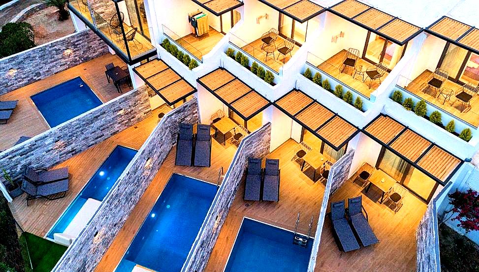 aerial view of suites with private pools and terraces