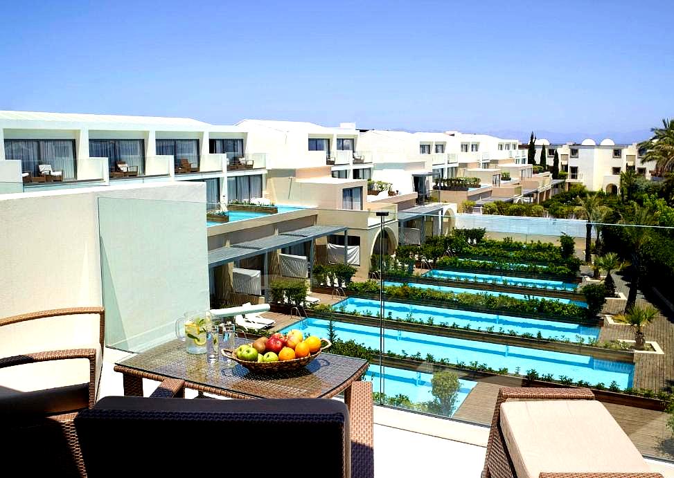 balcony view of luxury suites with private pools