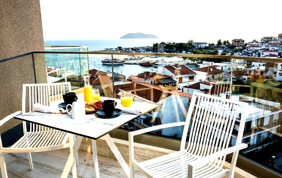 balcony with sea view and breakfast setting