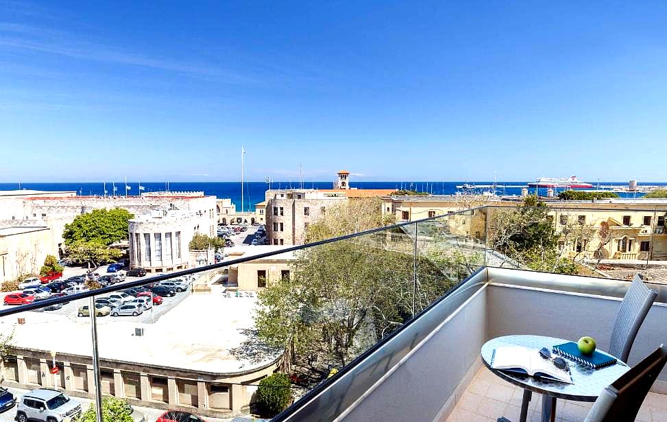 balcony with sea view and city skyline