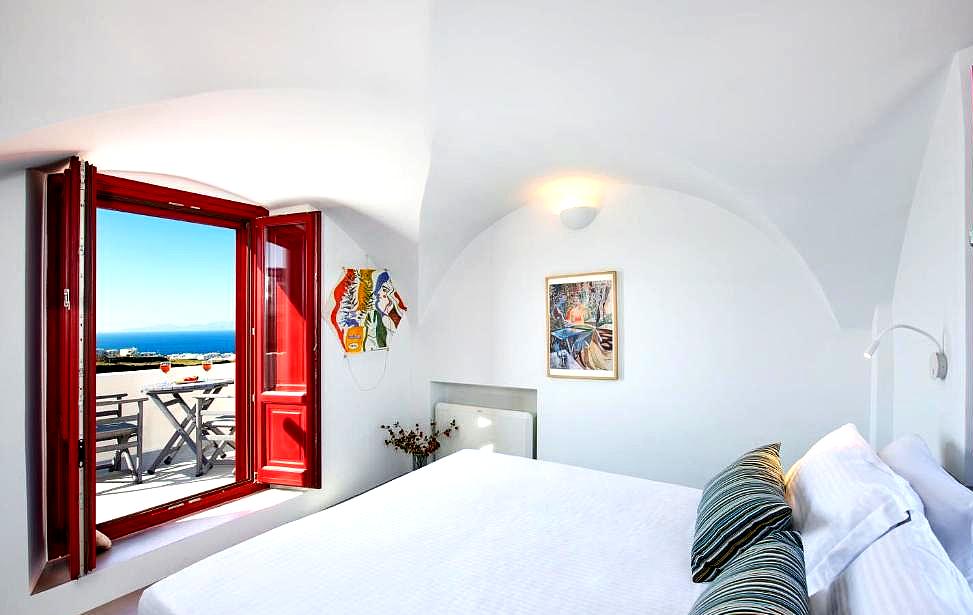 bedroom with sea view and red windows