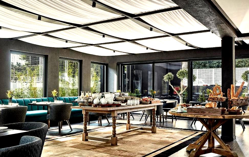 bright dining area with buffet and natural light