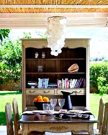 charming dining area with rustic furniture and garden view