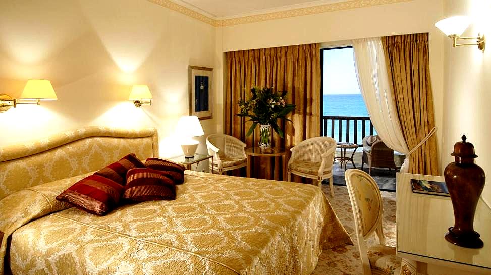 classic suite with elegant decor and sea view balcony