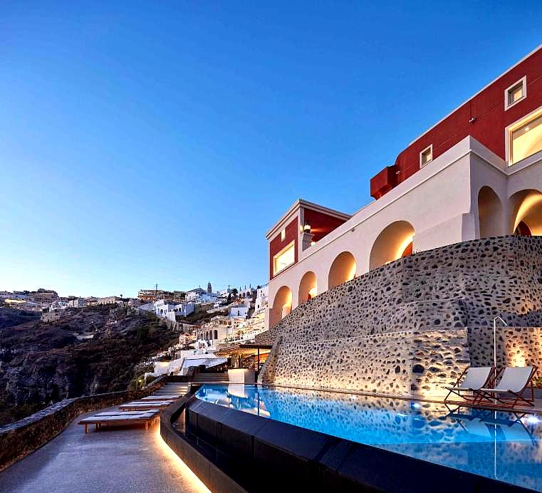 cliffside hotel with infinity pool and sea view