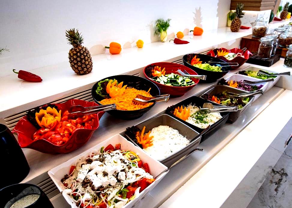 colorful salad bar with variety of fresh vegetables