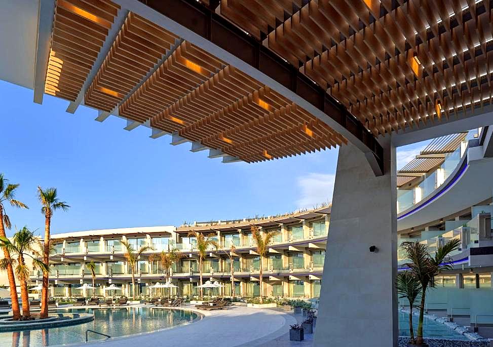 contemporary hotel courtyard with pool and modern architecture