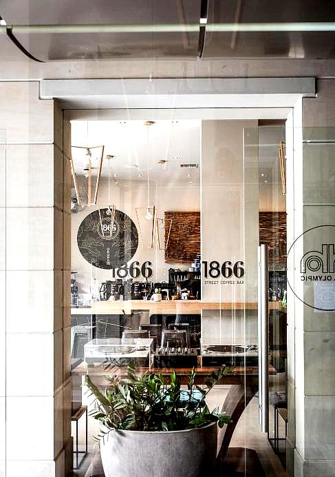 contemporary hotel lobby with bar and window view