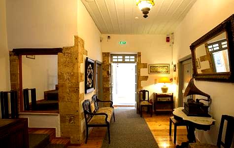 cozy hallway with antique furniture and mirrors