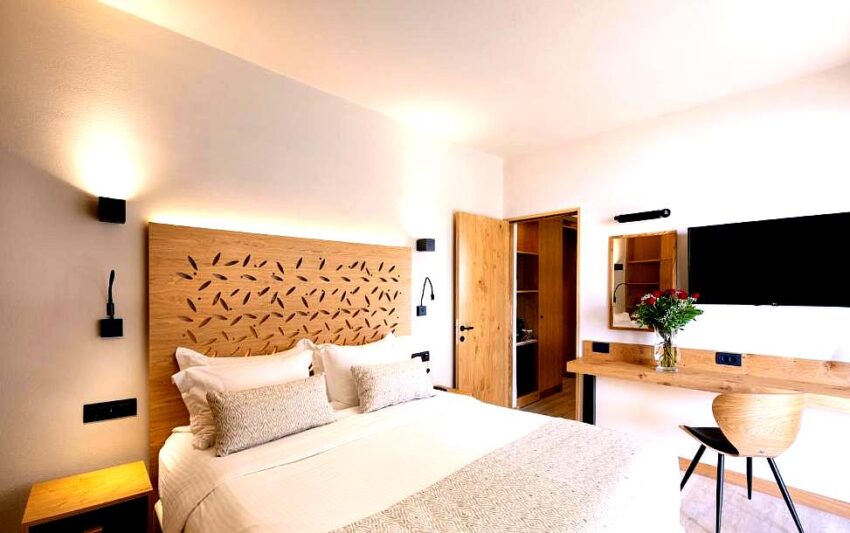 cozy hotel room with modern wooden furnishings and decor