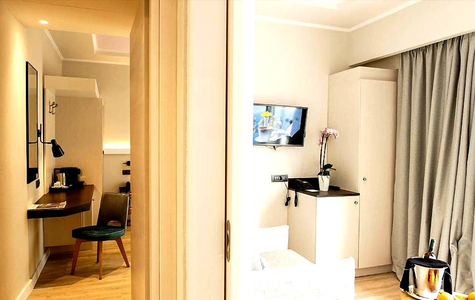 cozy suite corridor with workspace and amenities