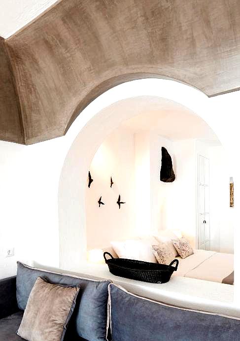 cozy suite with arched entrance and elegant decor