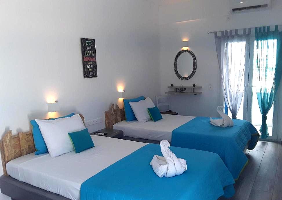 double bed room with blue decor