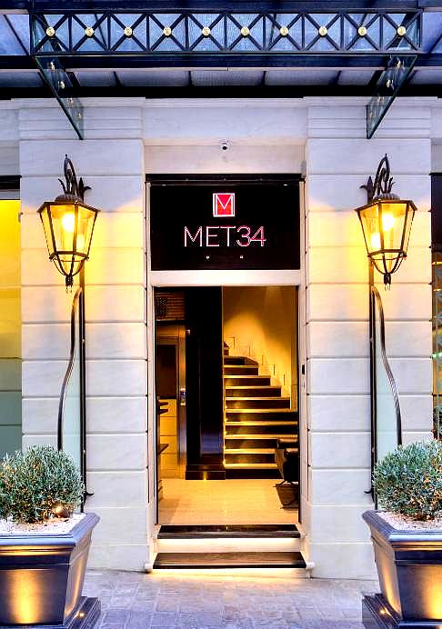 elegant hotel entrance with classic lanterns