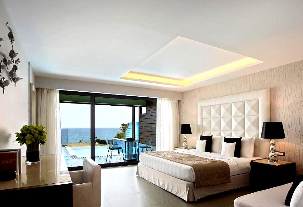 elegant hotel room with sea view and private pool