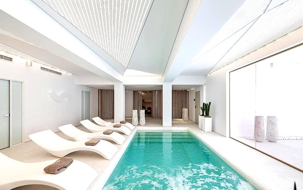 elegant indoor pool with natural light