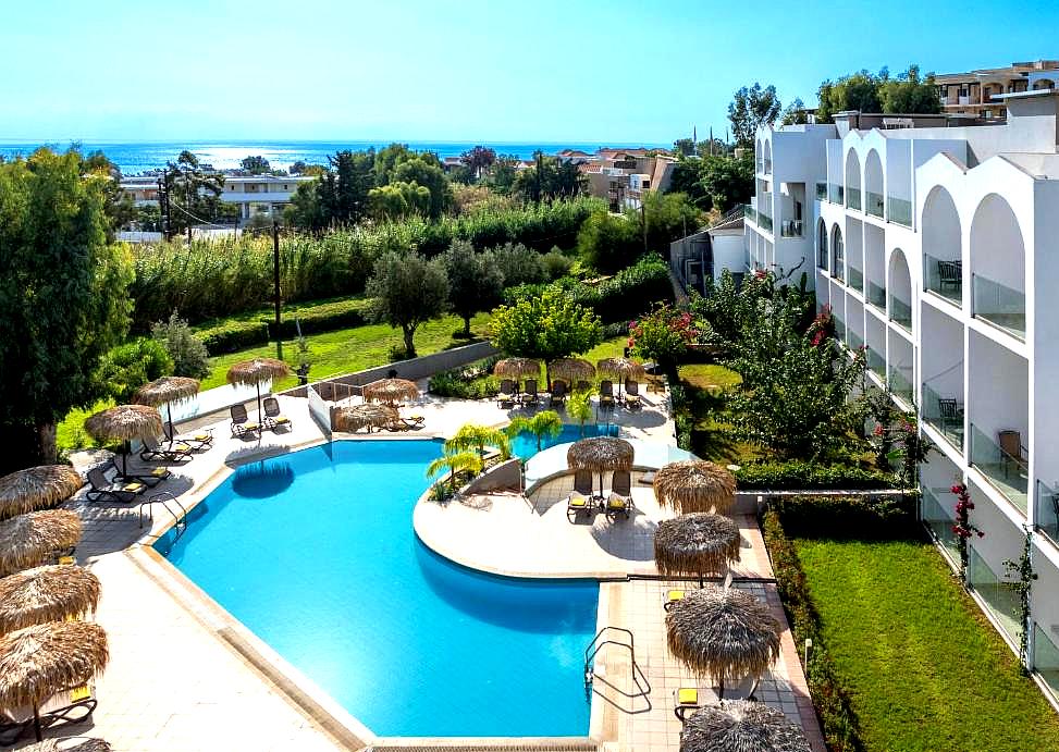 elevated view of resort swimming pool and sea view