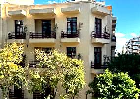 exterior of boutique hotel with balconies