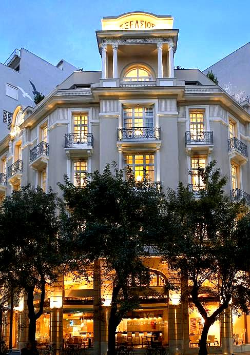 grand hotel exterior with evening illumination