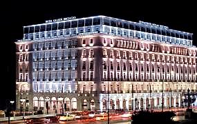 grand hotel facade illuminated at night