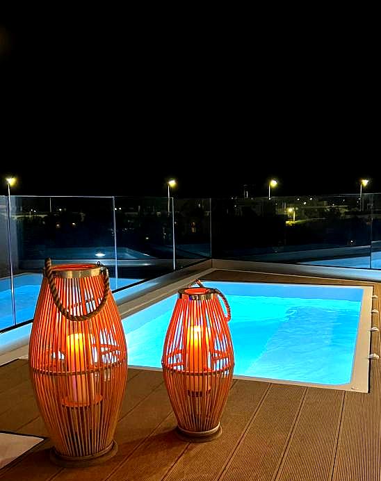 heated pool with night lighting