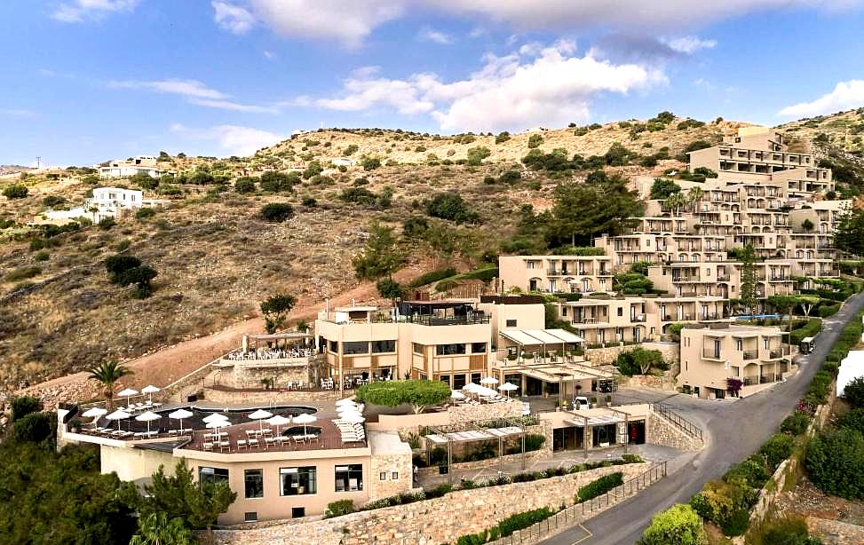 hillside hotel with terraces overlooking the sea