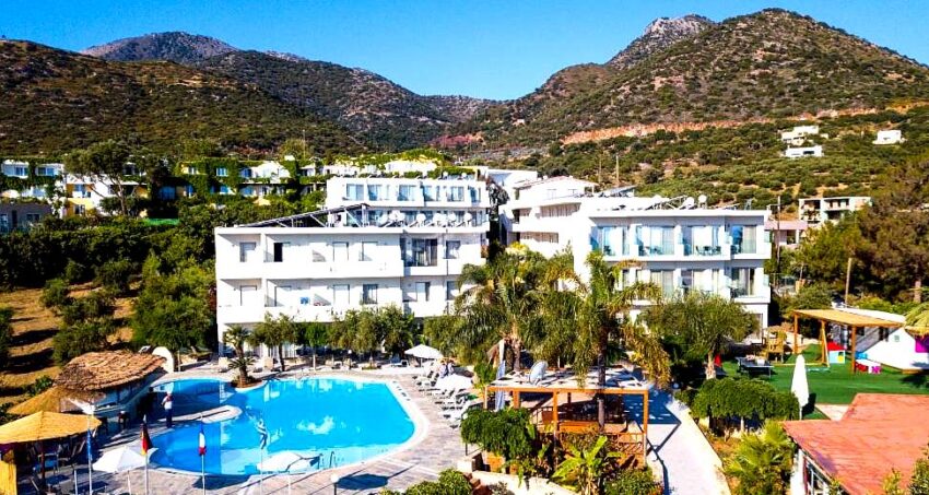 hotel with large pool and mountain view