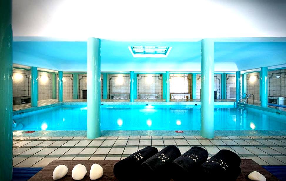 indoor spa pool with pillars