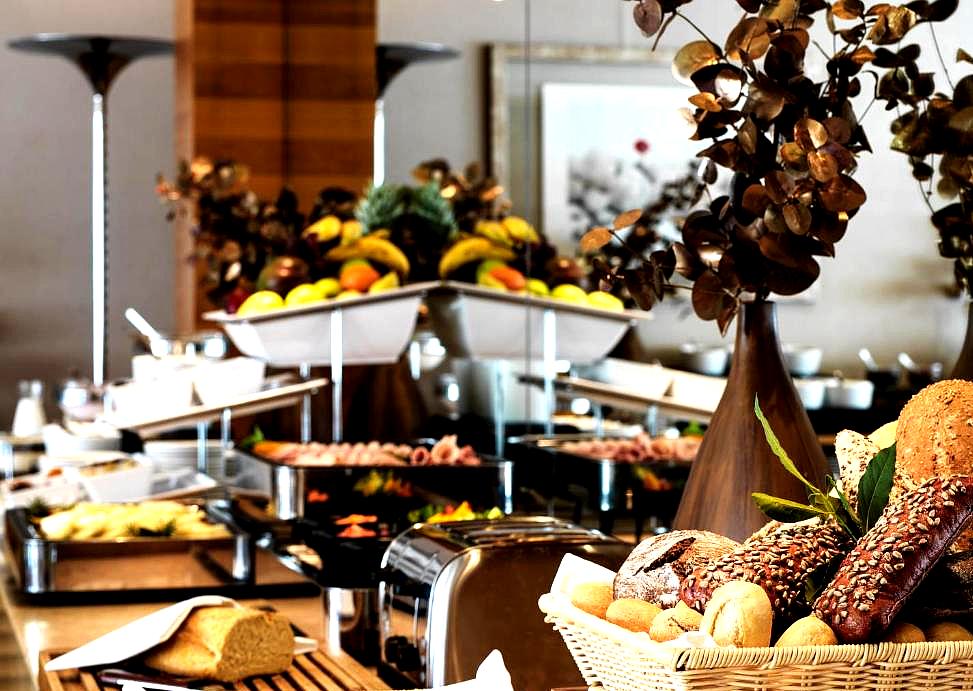 lavish breakfast buffet with fresh fruits and breads