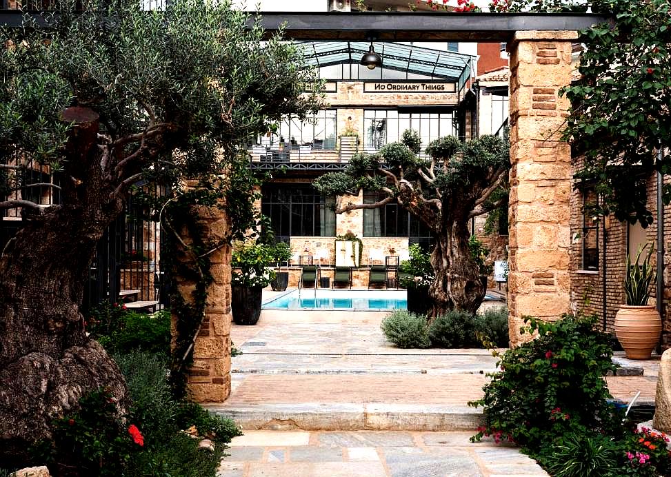 lush garden courtyard with pool view