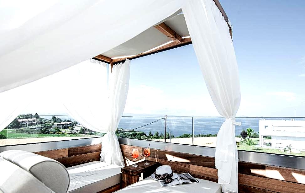 luxurious private cabana with sea view and sheer curtains