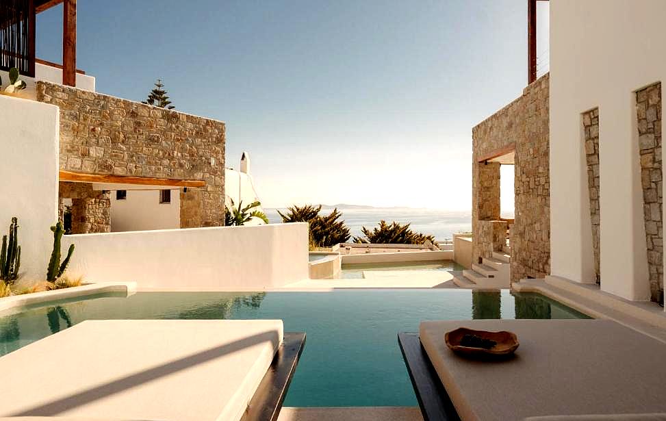 luxurious private pool area with sea view and sun loungers