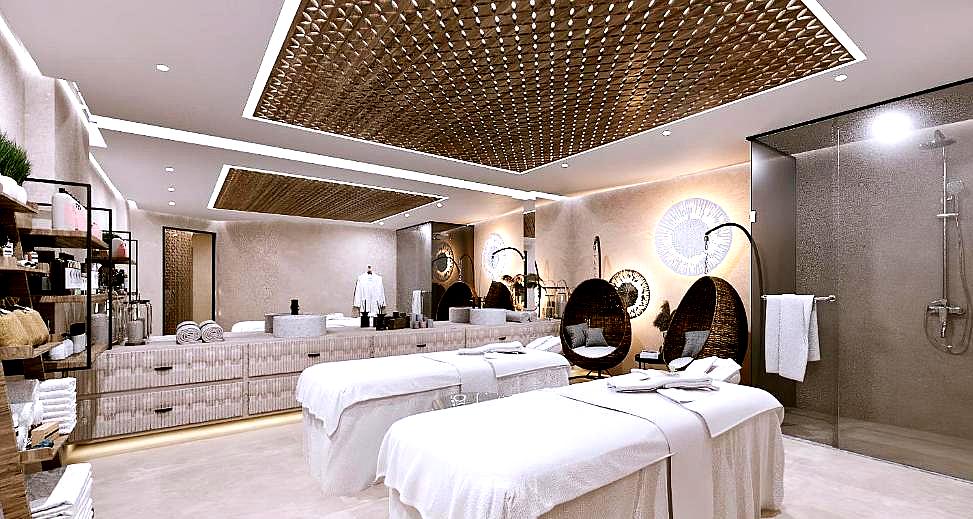 luxurious treatment room with massage beds and modern decor