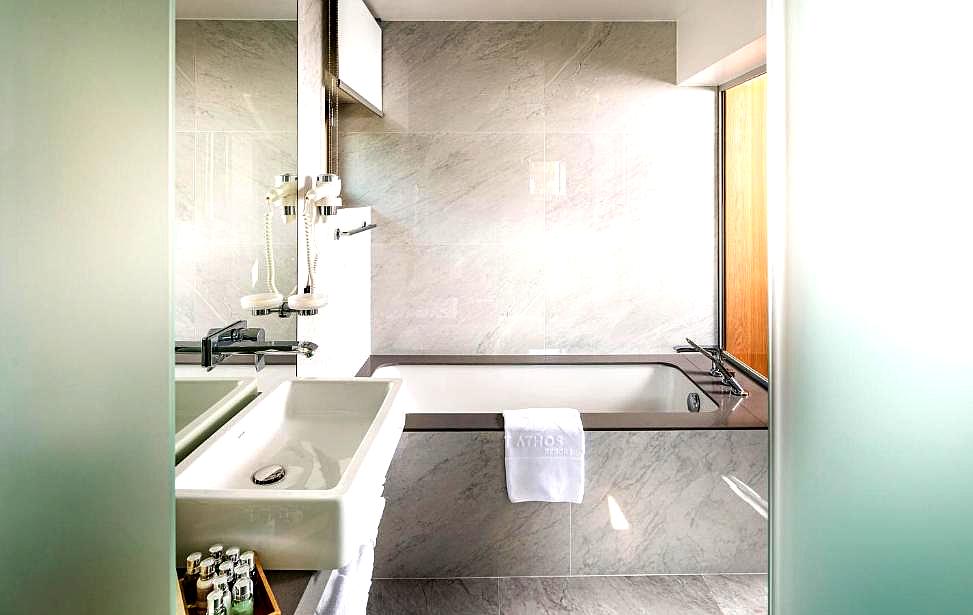 marble bathroom with deep soaking tub