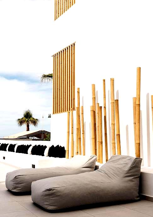 minimalist outdoor seating with modern decor and bamboo accents