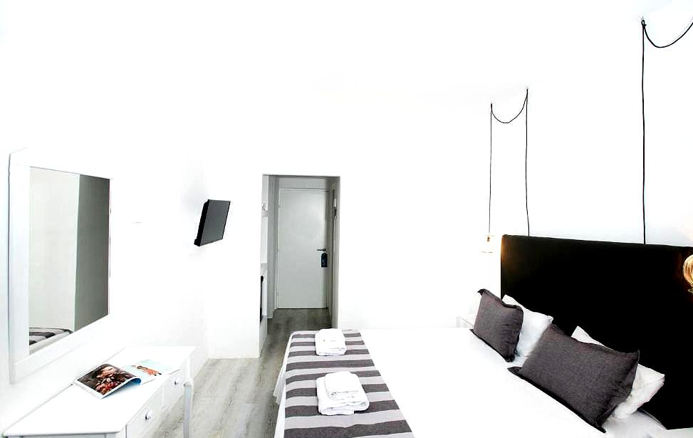 minimalist room with black and white decor