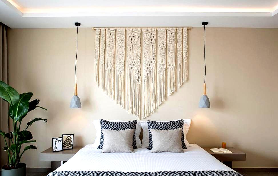 modern bedroom with decorative wall hanging