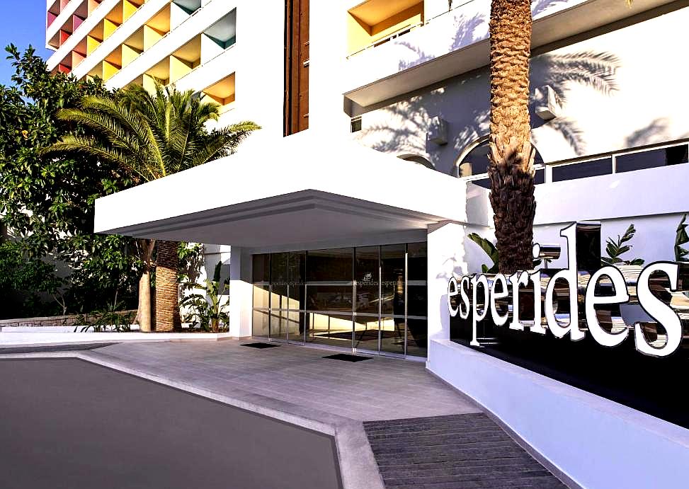 modern hotel entrance with palm trees